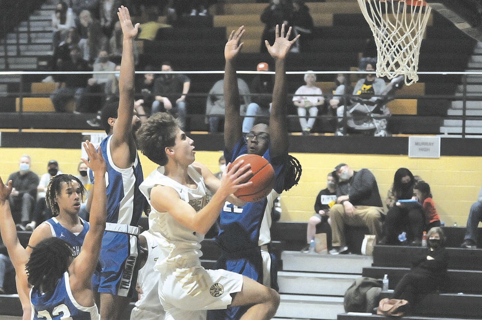 Whitaker’s 25 points helps Tigers hang on to beat Tilghman 56-52